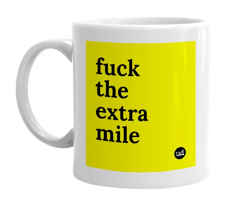 White mug with 'fuck the extra mile' in bold black letters