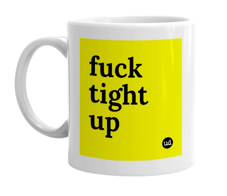 White mug with 'fuck tight up' in bold black letters