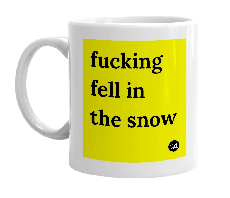 White mug with 'fucking fell in the snow' in bold black letters