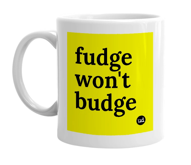 White mug with 'fudge won't budge' in bold black letters