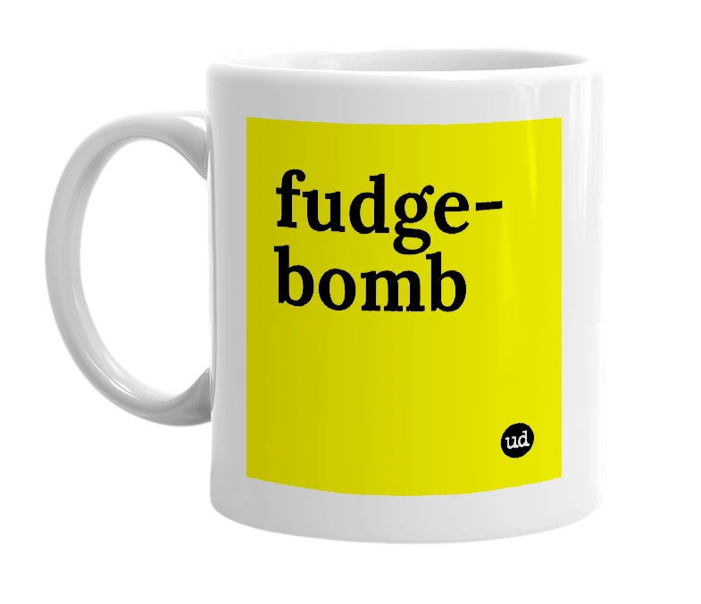 White mug with 'fudge-bomb' in bold black letters