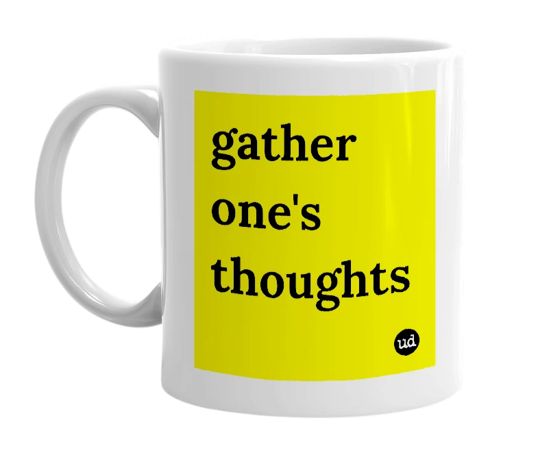 White mug with 'gather one's thoughts' in bold black letters