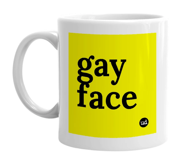 White mug with 'gay face' in bold black letters