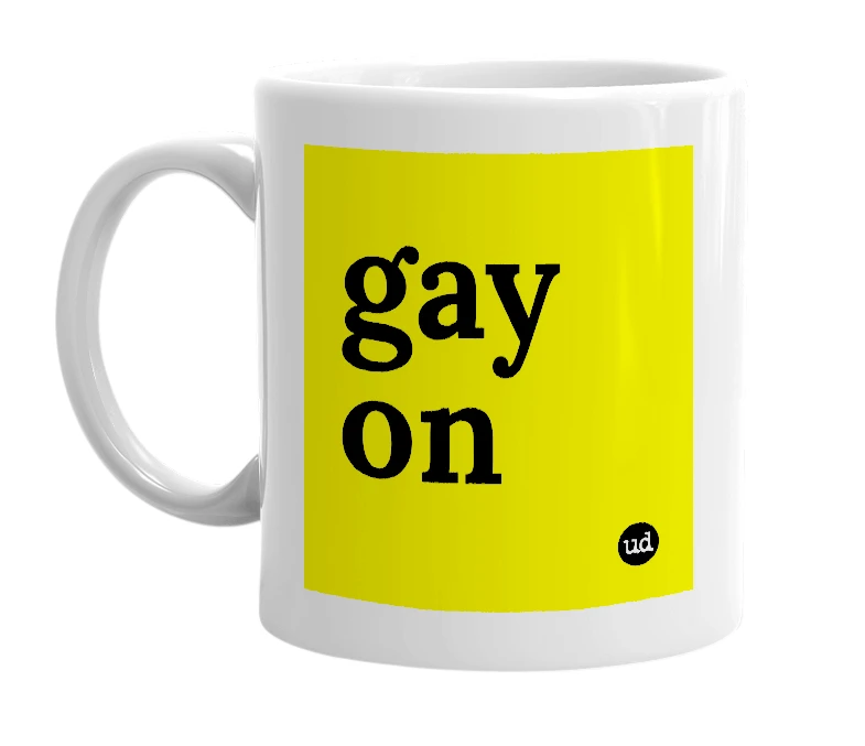 White mug with 'gay on' in bold black letters