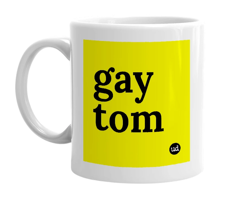 White mug with 'gay tom' in bold black letters