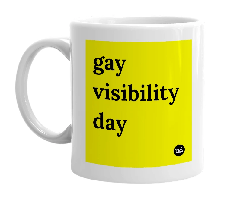 White mug with 'gay visibility day' in bold black letters