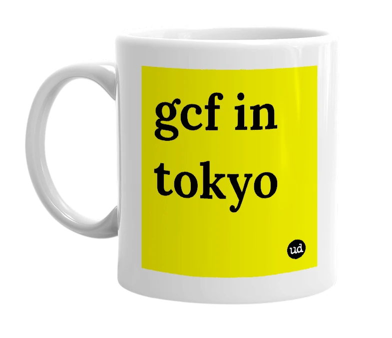 White mug with 'gcf in tokyo' in bold black letters