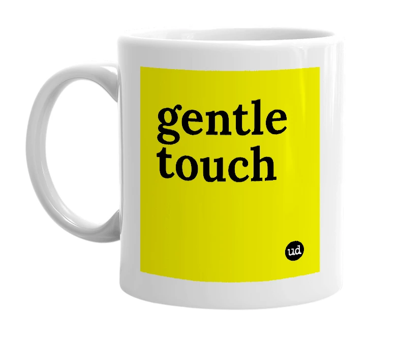 White mug with 'gentle touch' in bold black letters