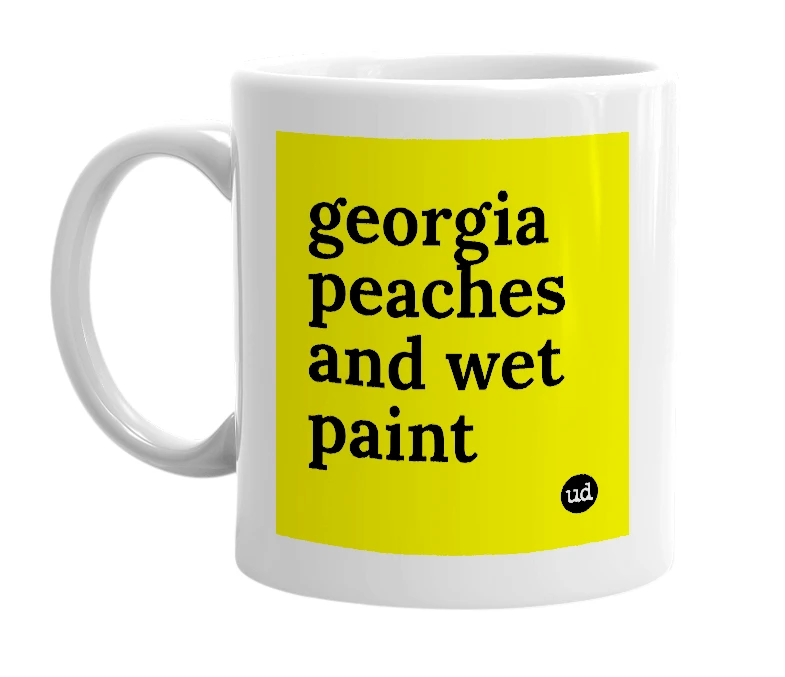 White mug with 'georgia peaches and wet paint' in bold black letters