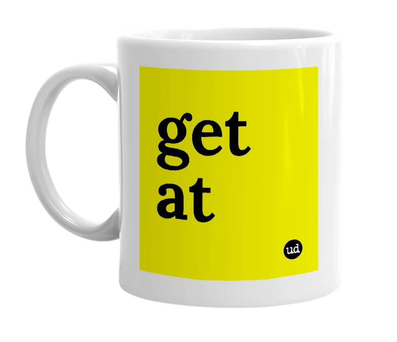 White mug with 'get at' in bold black letters