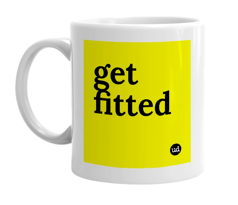 White mug with 'get fitted' in bold black letters