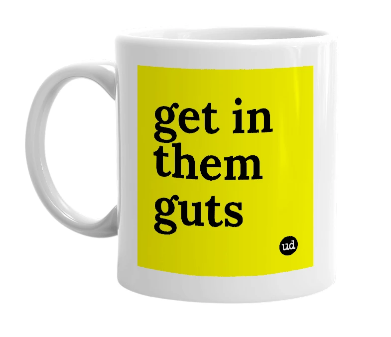 White mug with 'get in them guts' in bold black letters