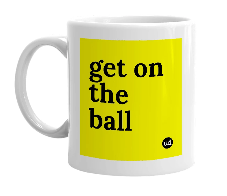 White mug with 'get on the ball' in bold black letters