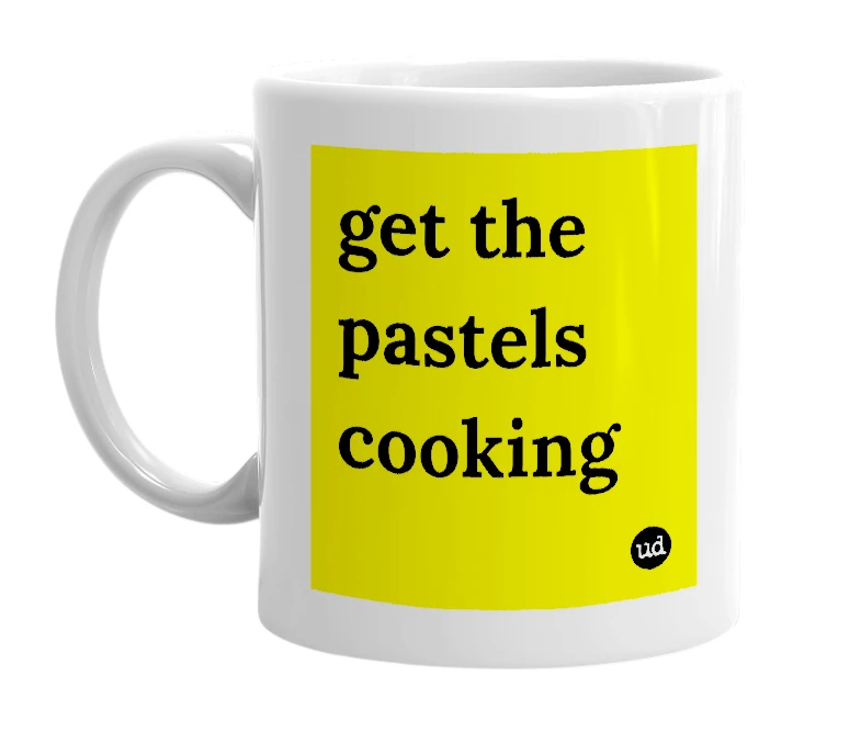 White mug with 'get the pastels cooking' in bold black letters