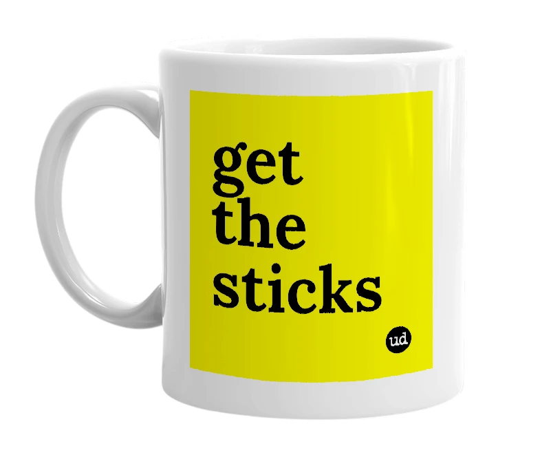 White mug with 'get the sticks' in bold black letters
