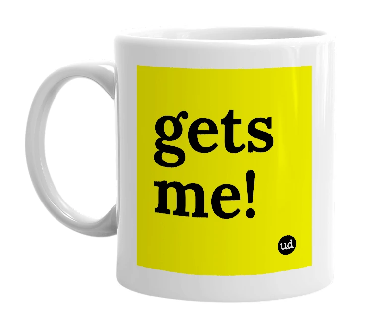 White mug with 'gets me!' in bold black letters