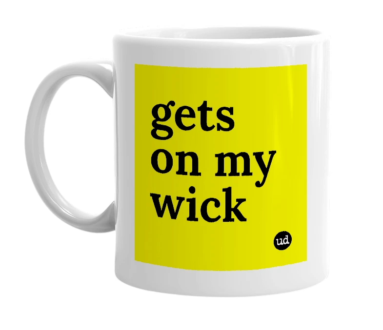 White mug with 'gets on my wick' in bold black letters