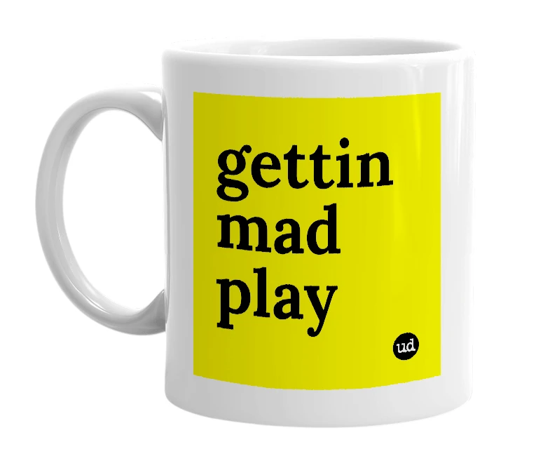 White mug with 'gettin mad play' in bold black letters