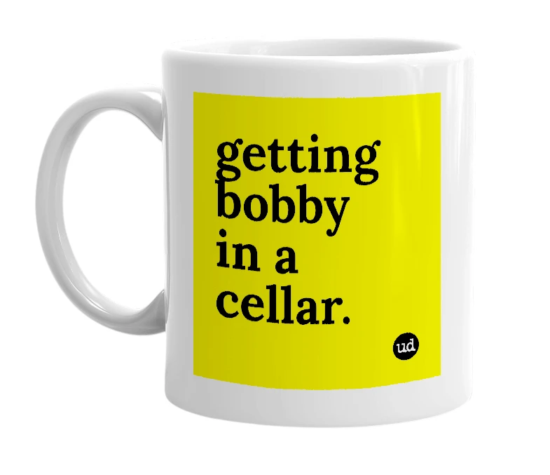 White mug with 'getting bobby in a cellar.' in bold black letters
