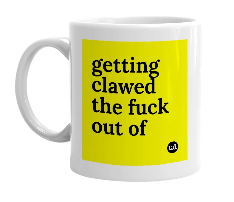 White mug with 'getting clawed the fuck out of' in bold black letters