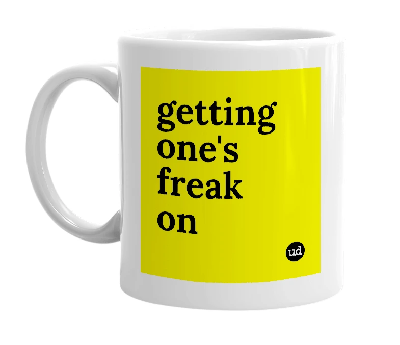 White mug with 'getting one's freak on' in bold black letters