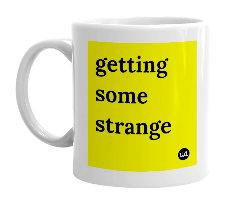 White mug with 'getting some strange' in bold black letters