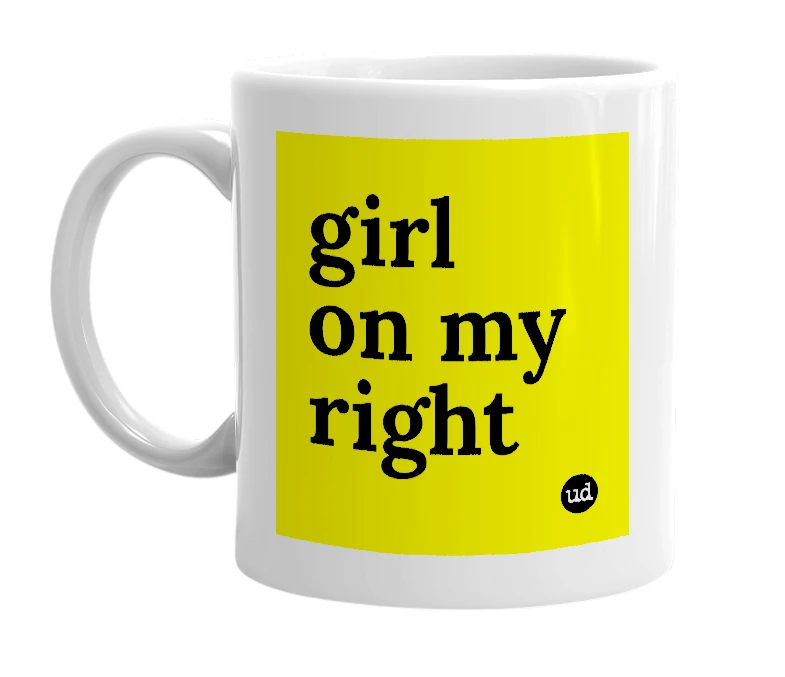 White mug with 'girl on my right' in bold black letters