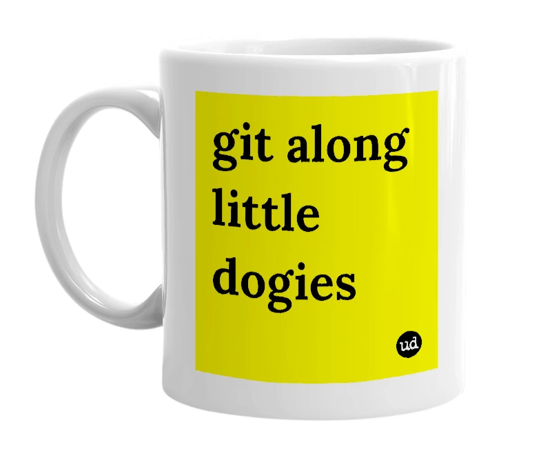 White mug with 'git along little dogies' in bold black letters