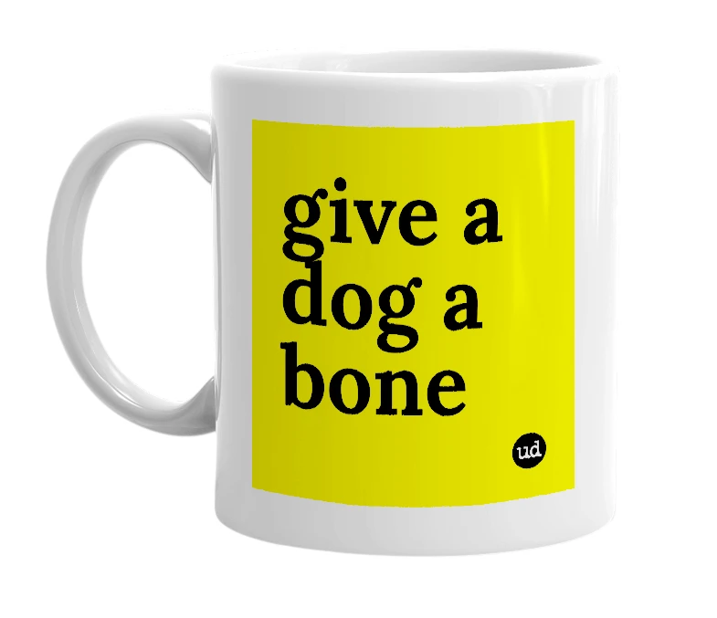 White mug with 'give a dog a bone' in bold black letters