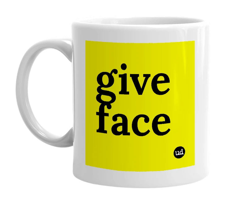 White mug with 'give face' in bold black letters