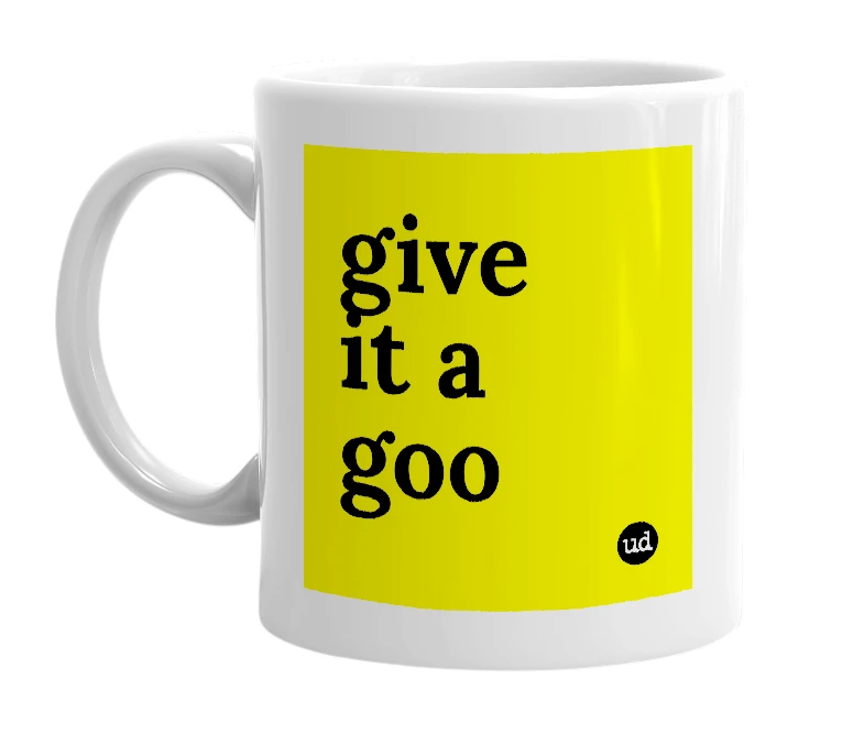 White mug with 'give it a goo' in bold black letters