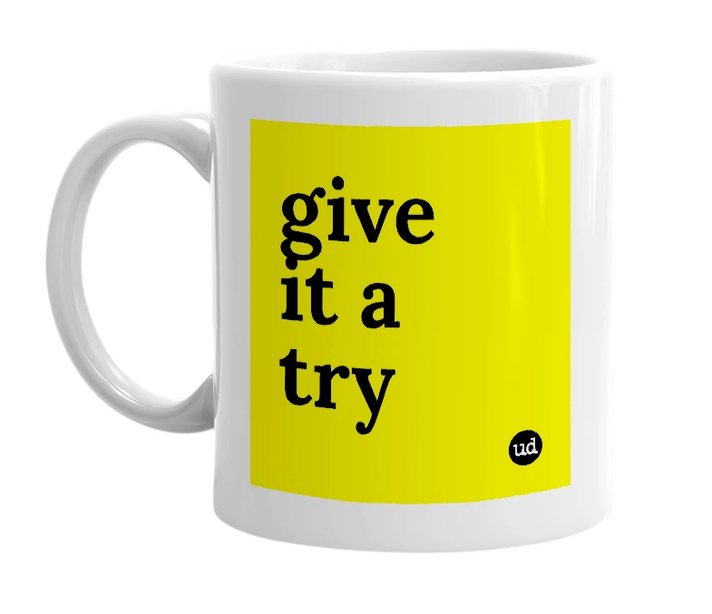 White mug with 'give it a try' in bold black letters