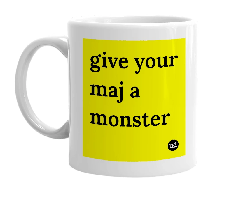 White mug with 'give your maj a monster' in bold black letters
