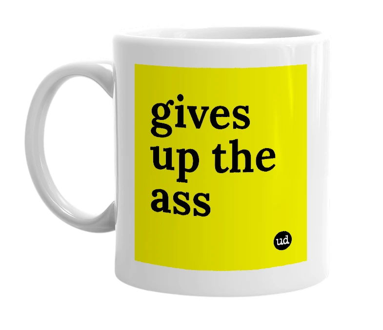 White mug with 'gives up the ass' in bold black letters