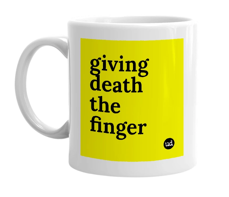 White mug with 'giving death the finger' in bold black letters