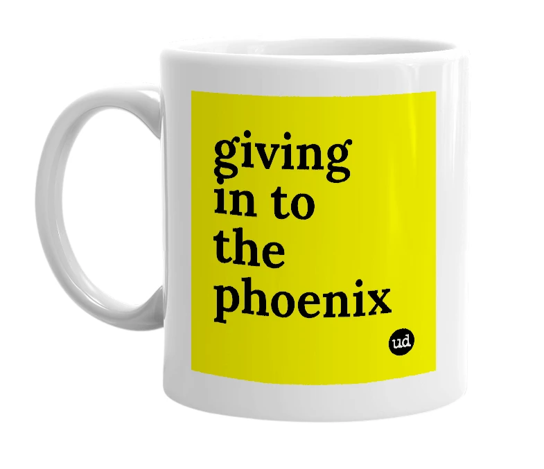 White mug with 'giving in to the phoenix' in bold black letters