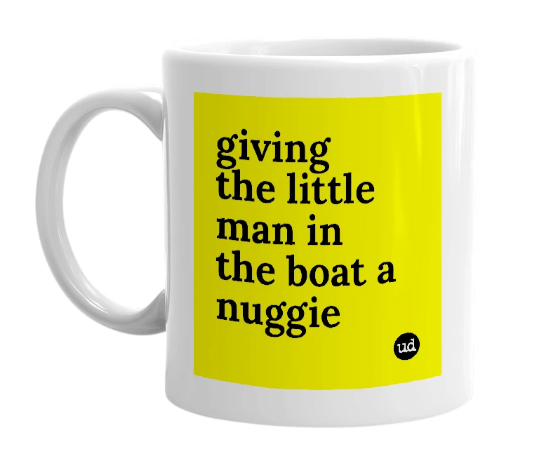 White mug with 'giving the little man in the boat a nuggie' in bold black letters