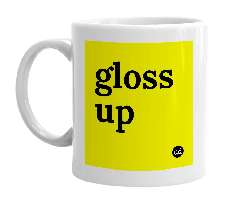 White mug with 'gloss up' in bold black letters