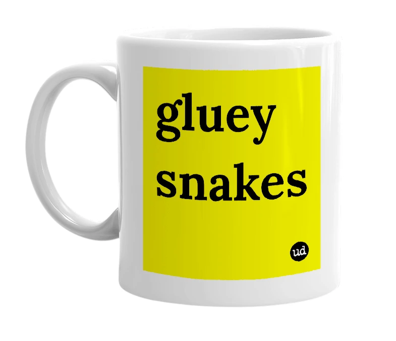White mug with 'gluey snakes' in bold black letters
