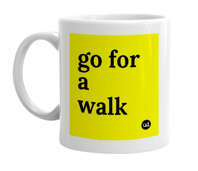 White mug with 'go for a walk' in bold black letters