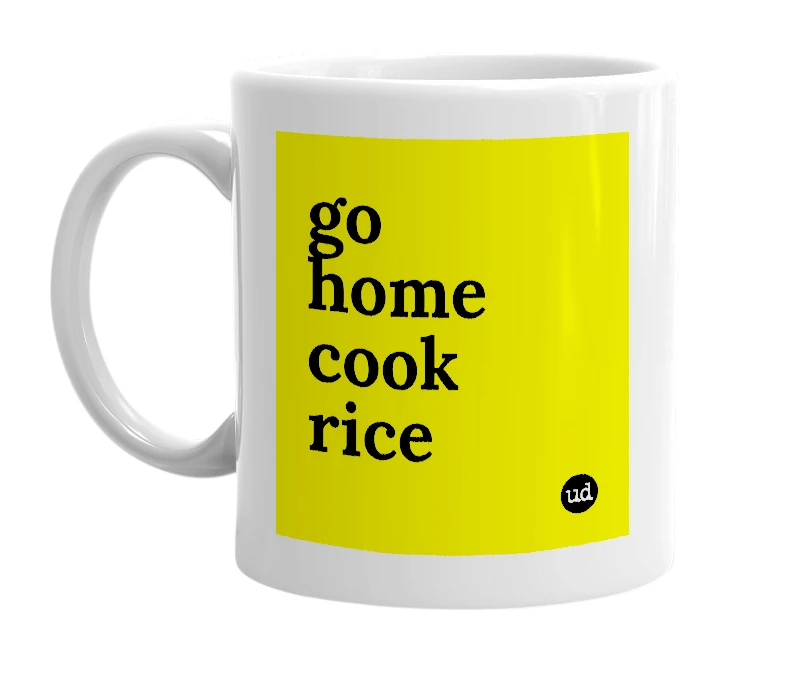 White mug with 'go home cook rice' in bold black letters