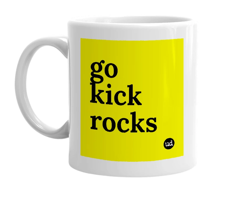 White mug with 'go kick rocks' in bold black letters