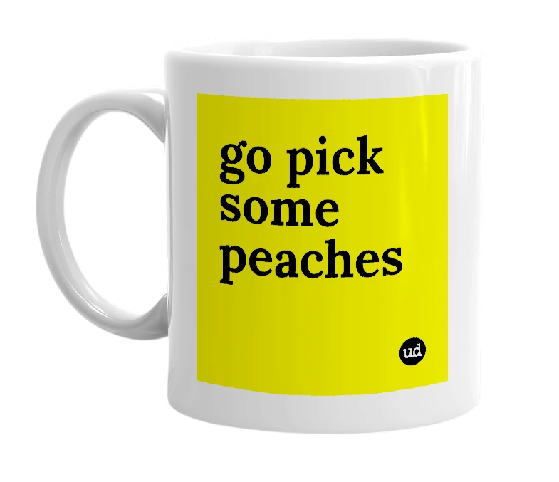 White mug with 'go pick some peaches' in bold black letters