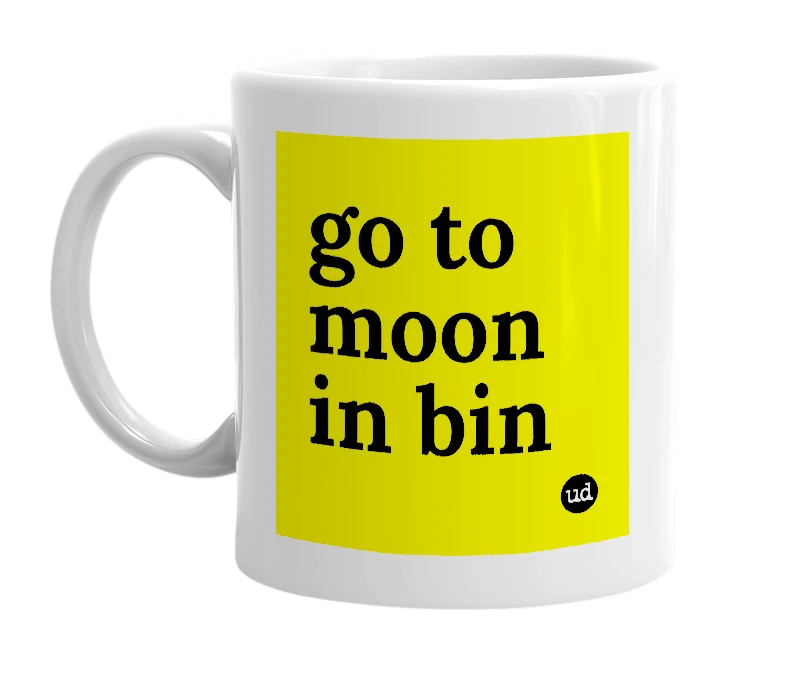 White mug with 'go to moon in bin' in bold black letters