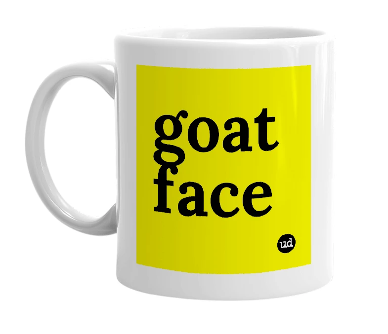 White mug with 'goat face' in bold black letters
