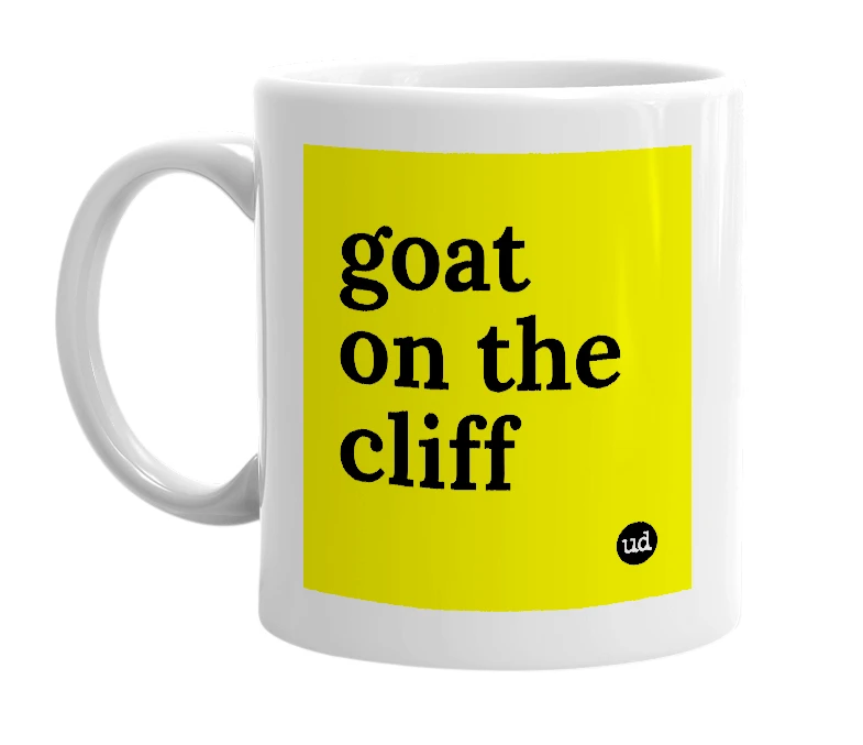 White mug with 'goat on the cliff' in bold black letters