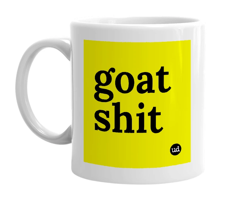 White mug with 'goat shit' in bold black letters