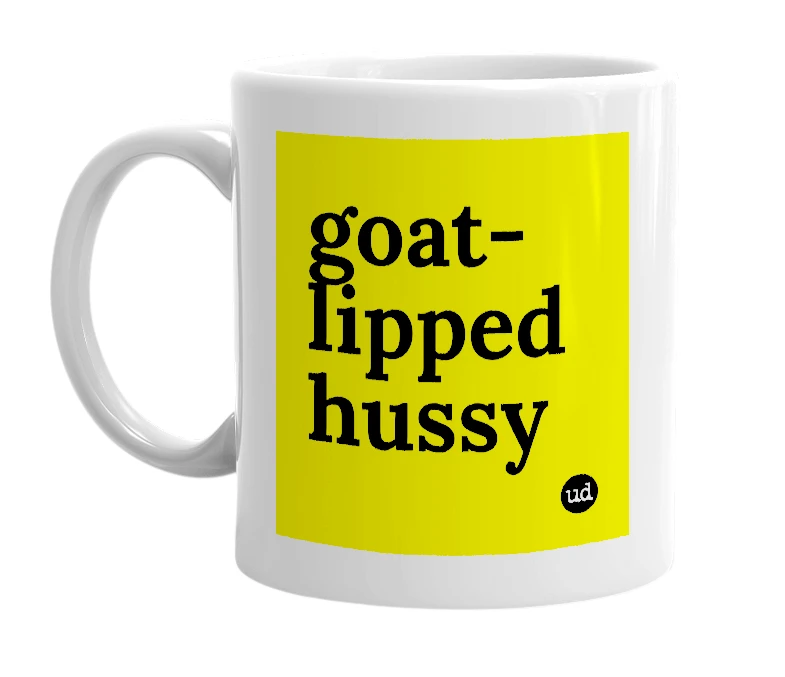 White mug with 'goat-lipped hussy' in bold black letters