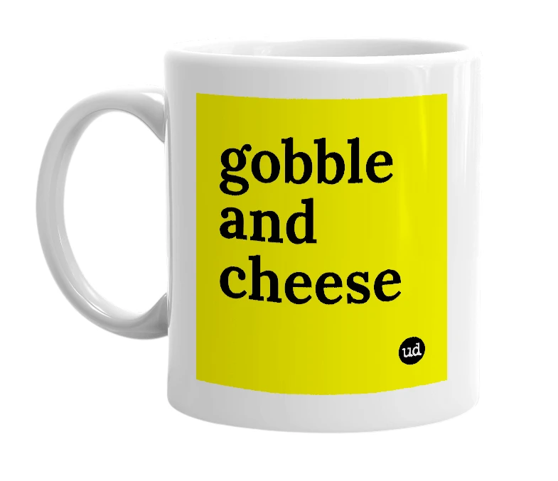 White mug with 'gobble and cheese' in bold black letters