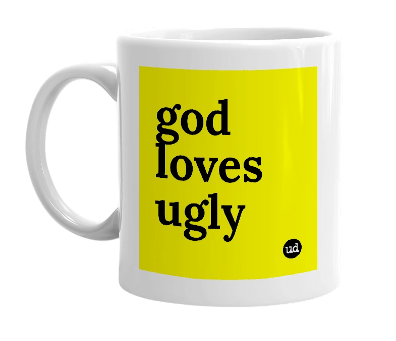 White mug with 'god loves ugly' in bold black letters